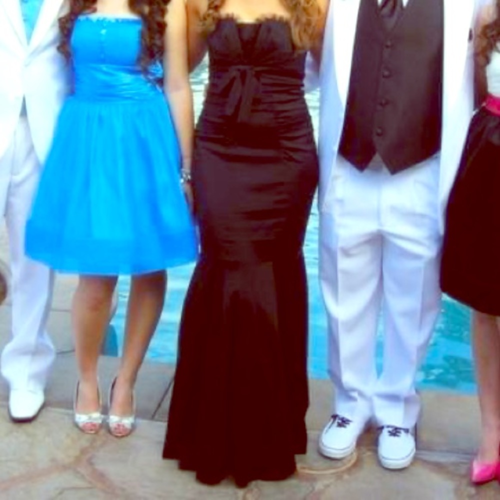 Gorgeous, timeless,versatile black strapless gown